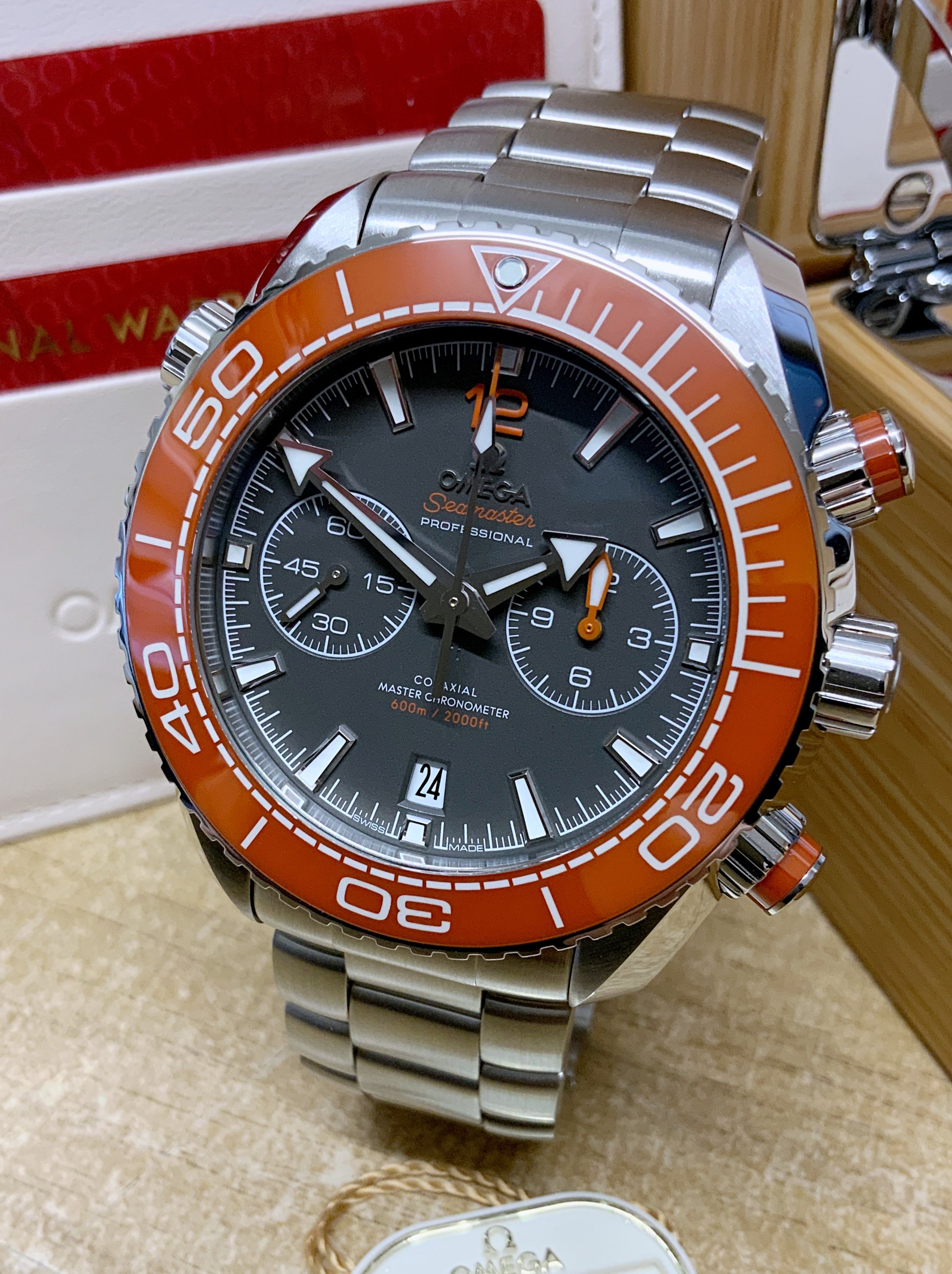 Omega Planet Ocean Chronograph 215.30.46.51.99.001 Grey Dial Orange Bezel Unworn